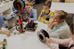 children looking at robots